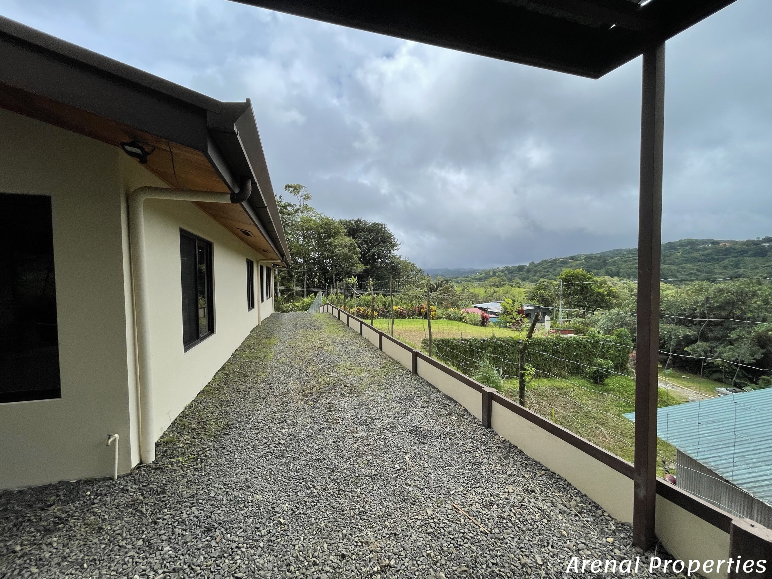 Modern 4-Bedroom Home with Lush Views & Privacy - Minutes from Downtown Nuevo Arenal.